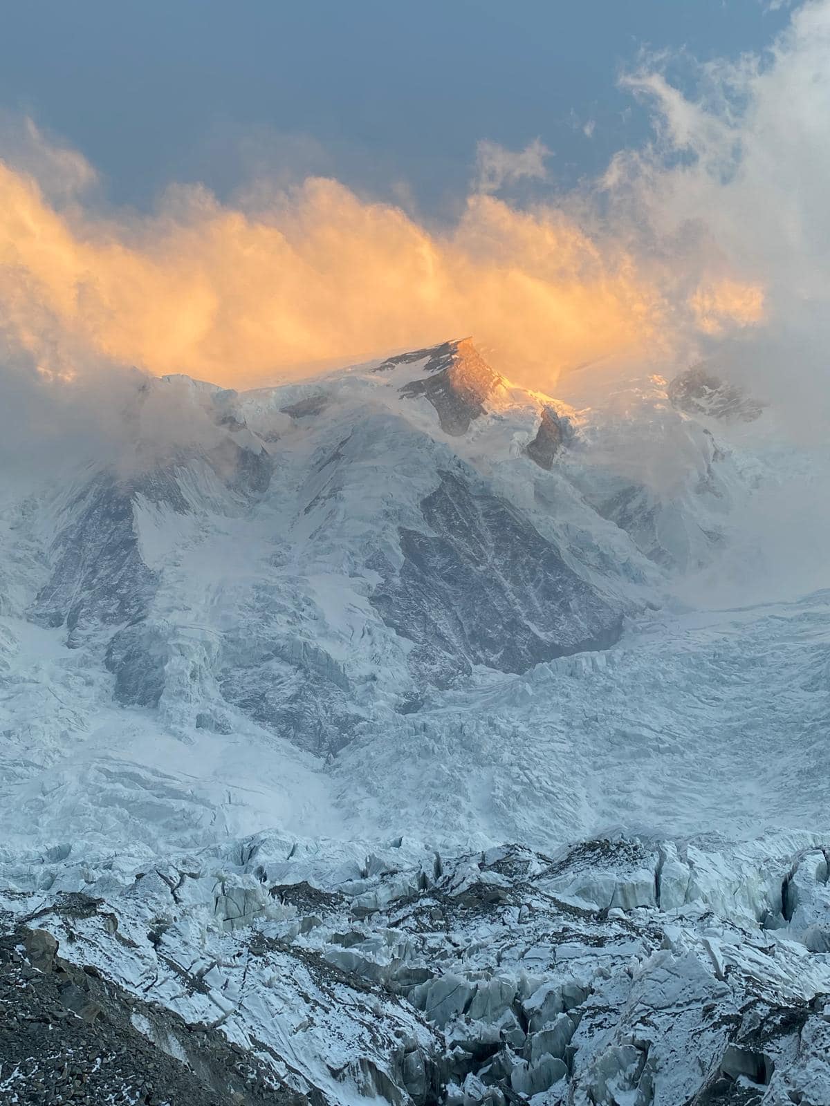 A towering Himalayan peak at sunset, alpenglow on the summit — preview image for the Kangchenjunga attempt